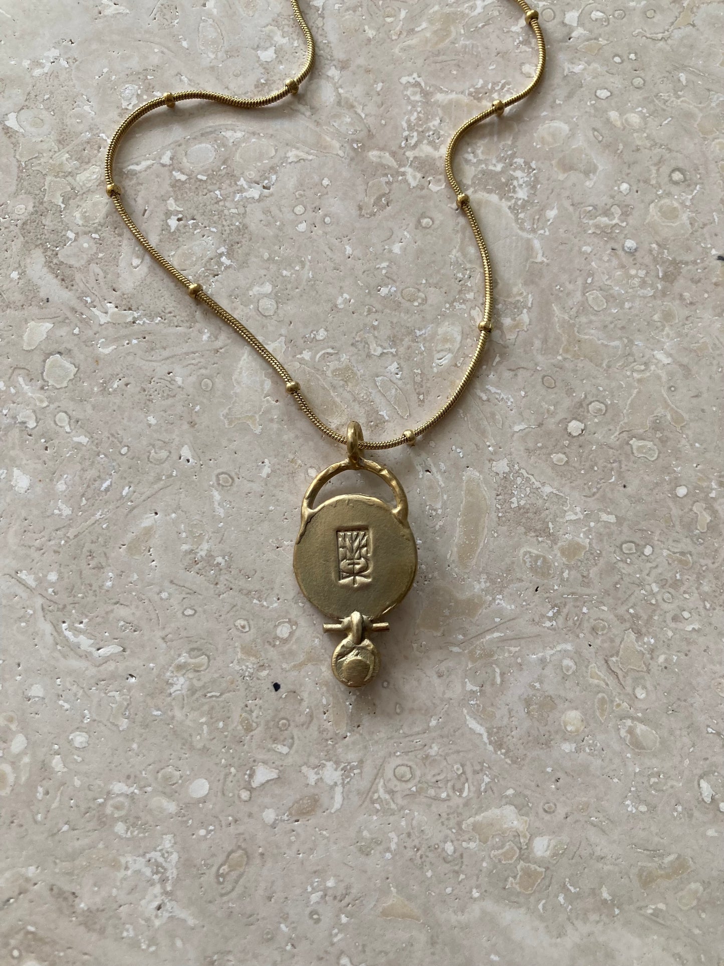 Solid Brass Mini ‘Eia’ Necklace On Gold Plated Waterproof Stainless Steel Chain